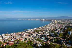 a large body of water surrounded by a city