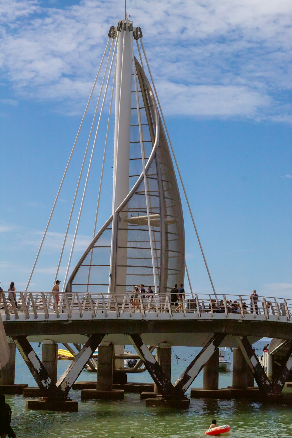 a very tall bridge with a very tall tower on top of it