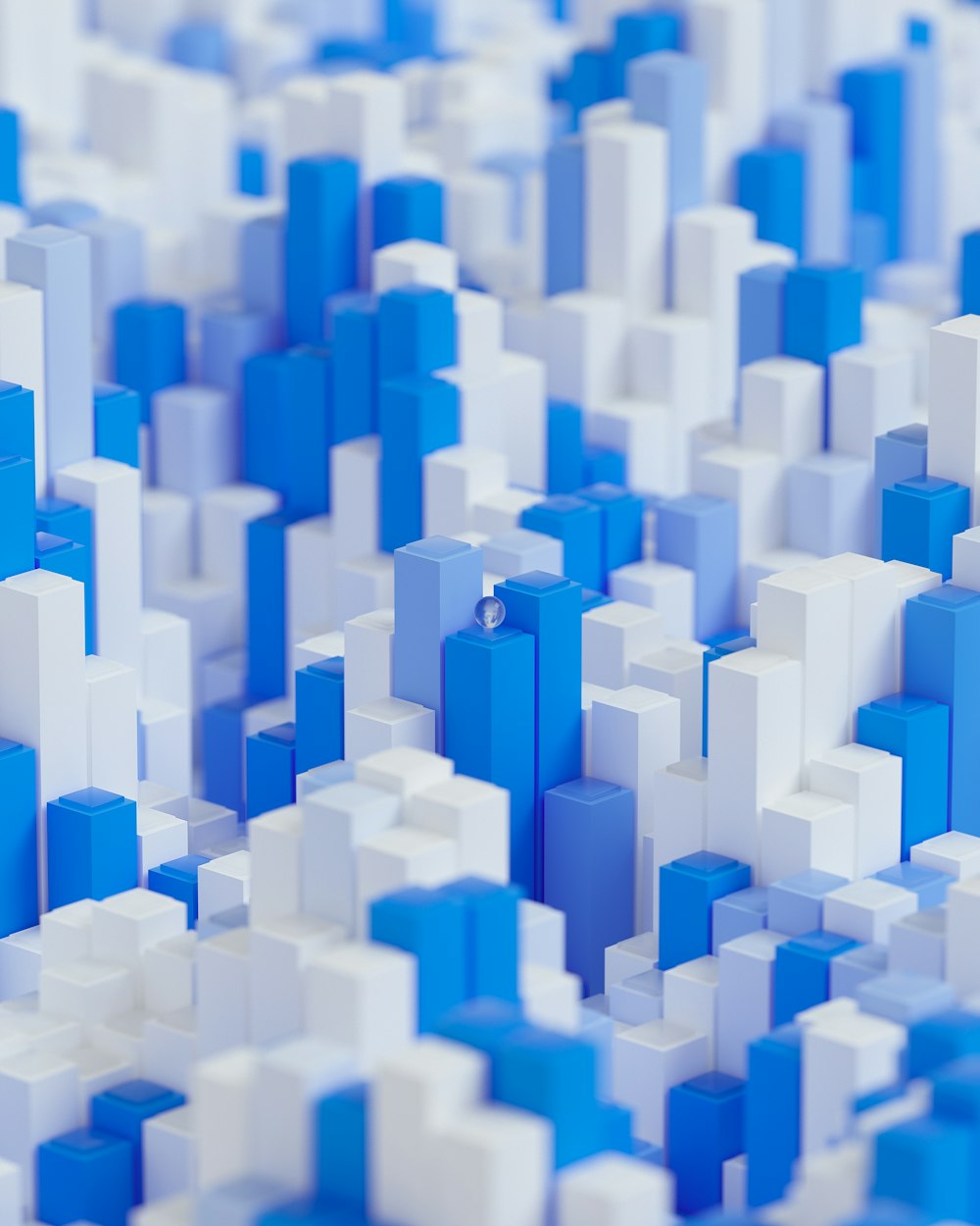 a close up of a blue and white pattern of cubes