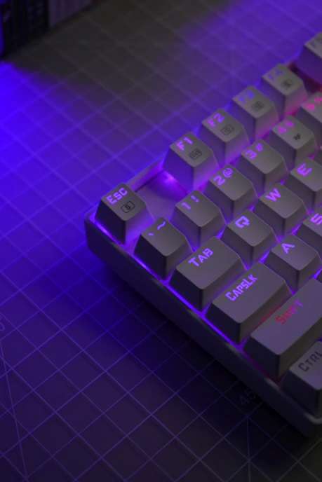 a computer keyboard sitting on top of a table