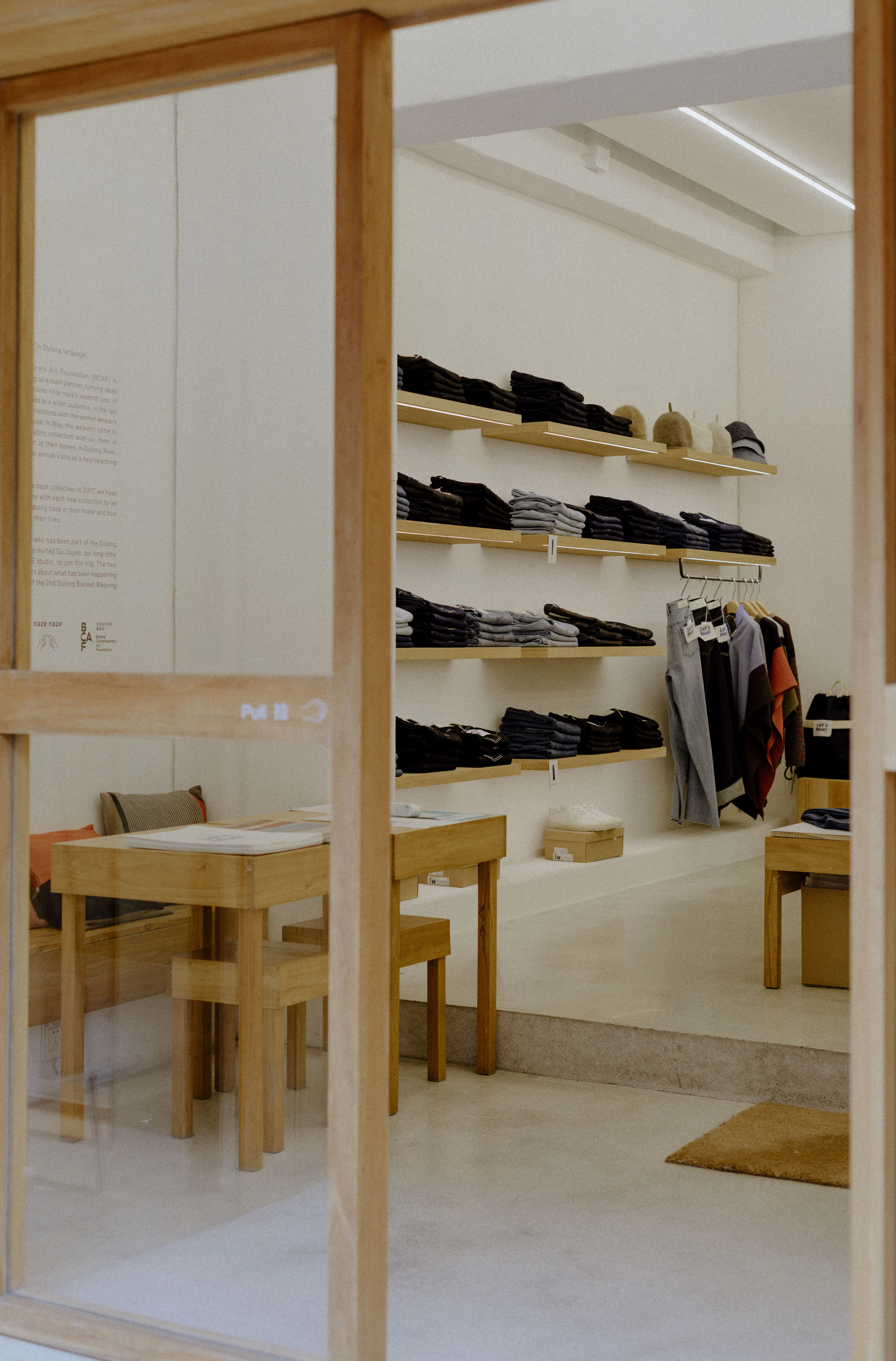 Backlit timber display shelving in a boutique