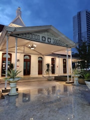 Pension building facade with welcoming entrance.