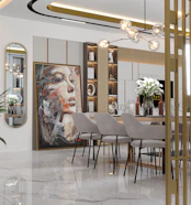 a dining room with a large painting on the wall