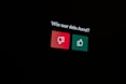 a black background with a red and green sign