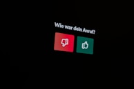 a black background with a red and green sign