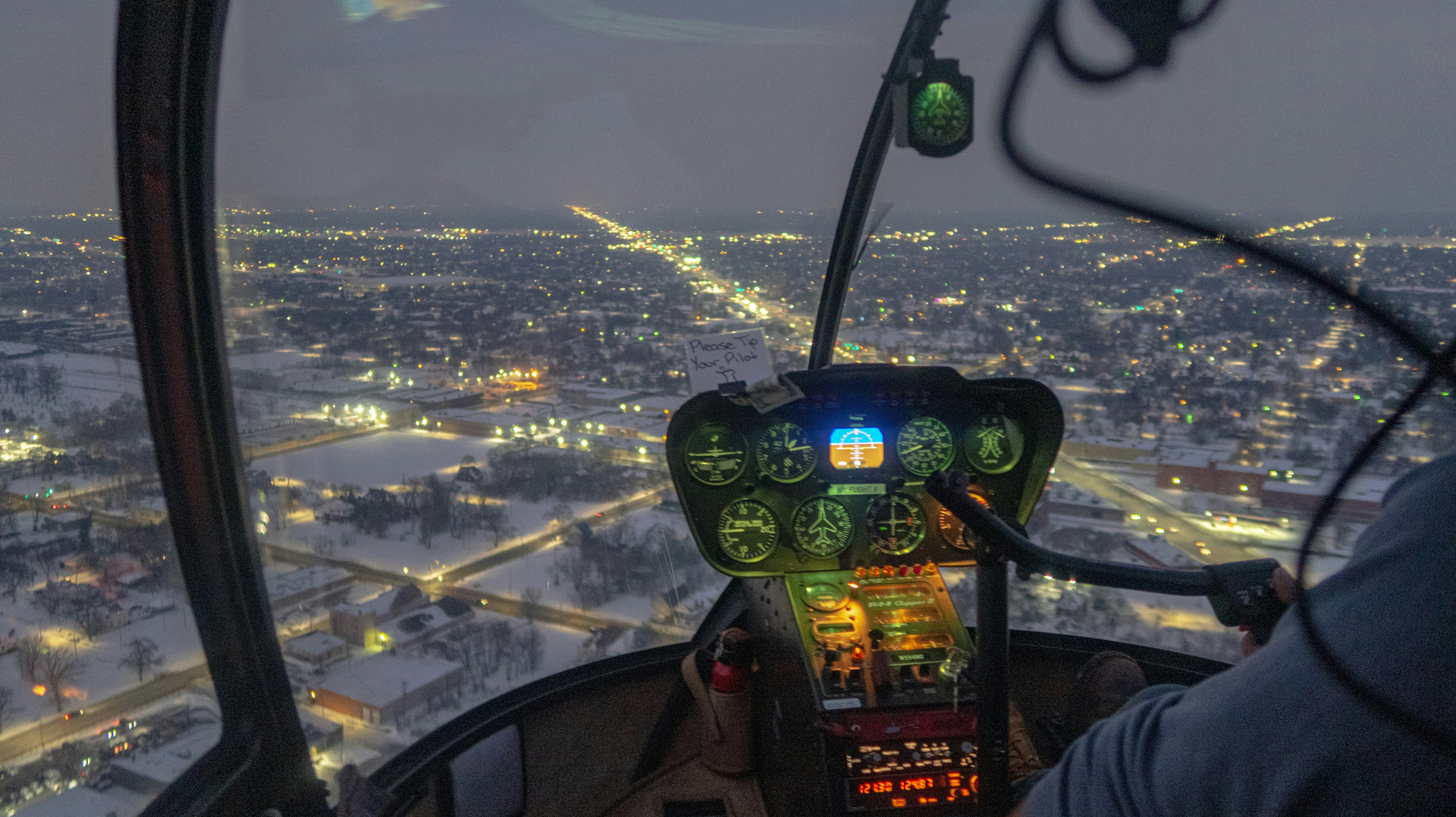 A view of a city from inside a helicopter photo – Free Building Image ...