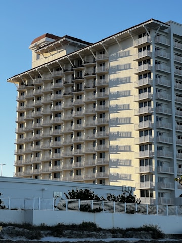 a tall building with balconies and balconies on top of it