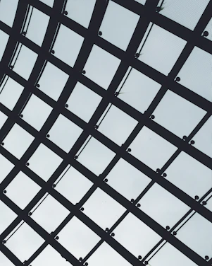 A sleek, minimalistic architectural grid pattern symbolizing structured growth and digital infrastructure.