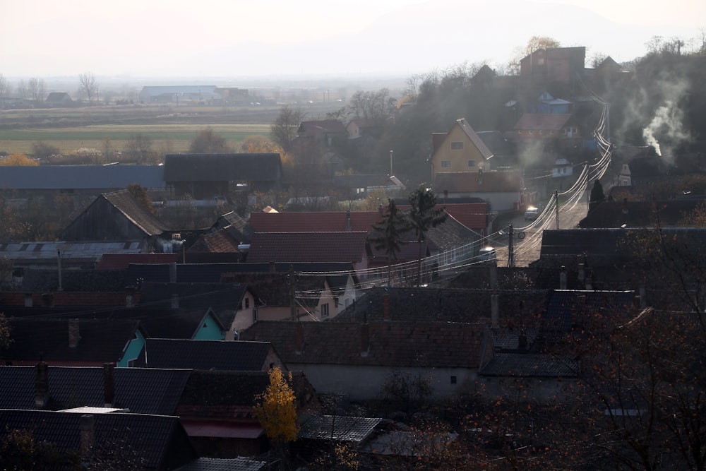 a view of a town with a lot of smoke coming out of it