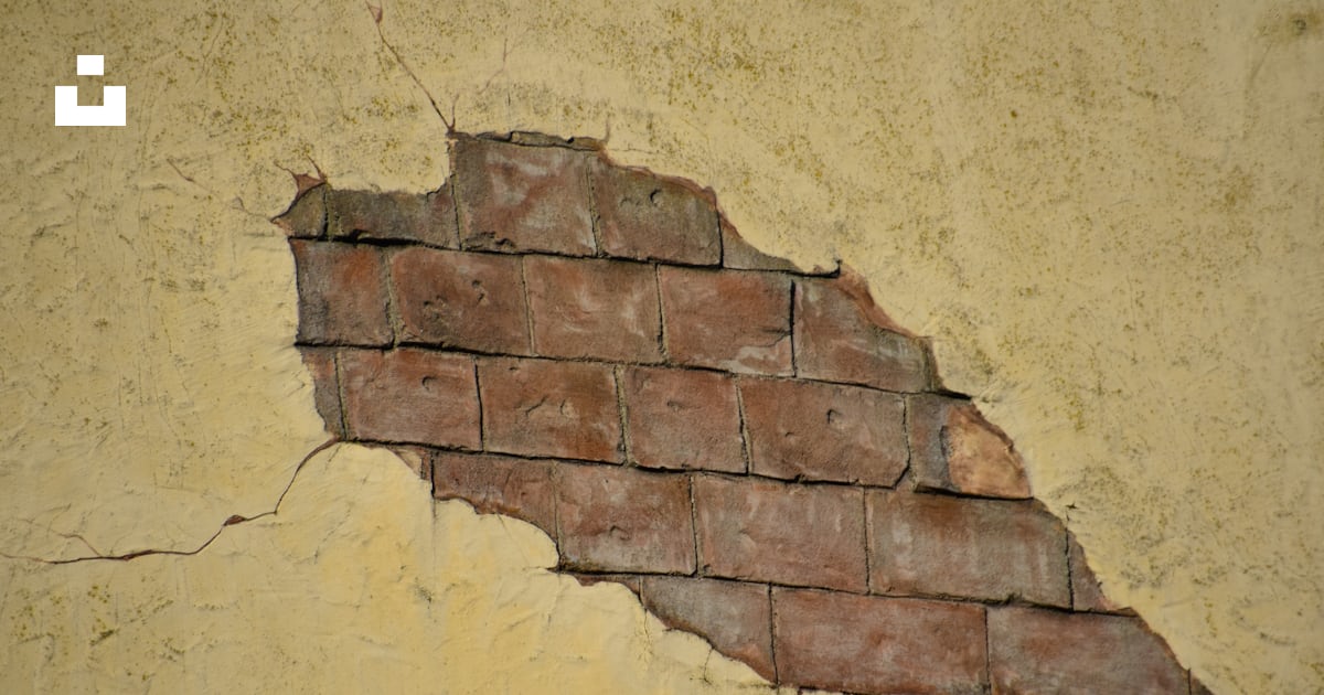 Foto zum Thema Eine Ziegelmauer mit einem Riss darin – Kostenloses Bild ...