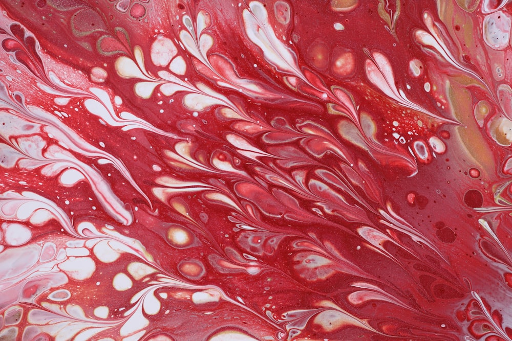 a close up view of a red and white substance