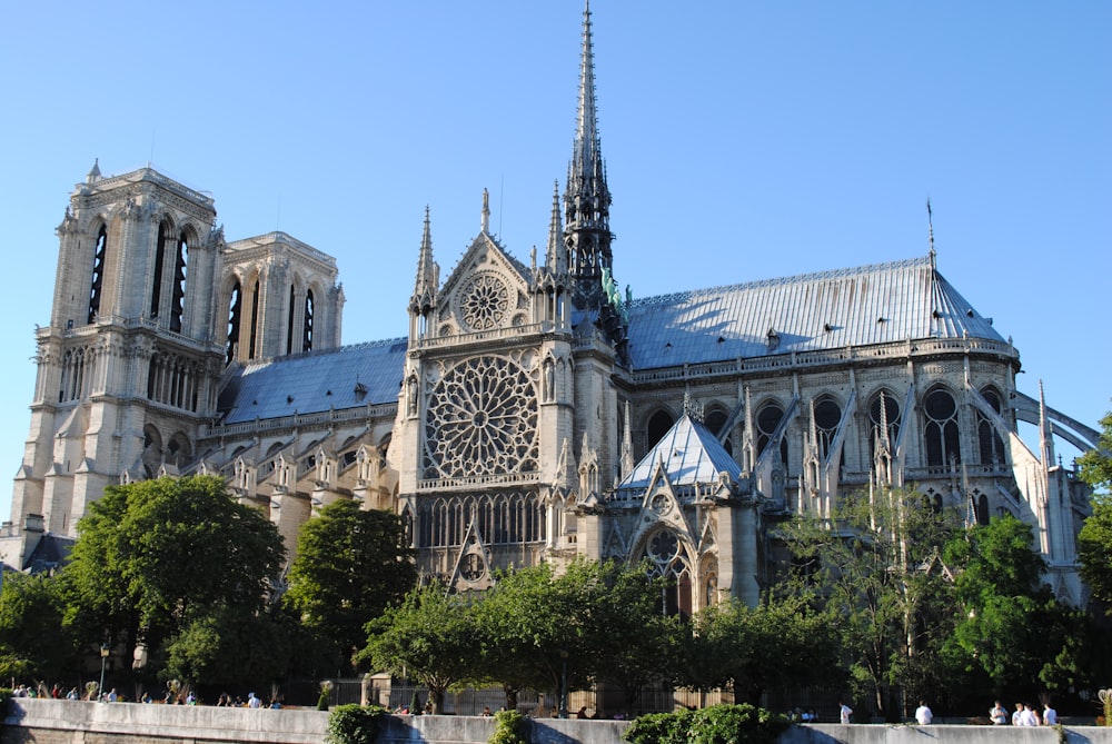 a large cathedral with a clock on the front of it