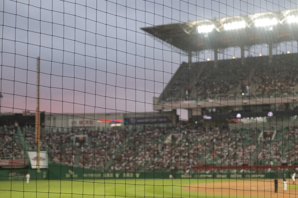 a baseball game in progress with the batter up to plate