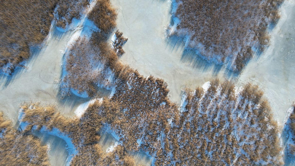 an aerial view of a snow covered area