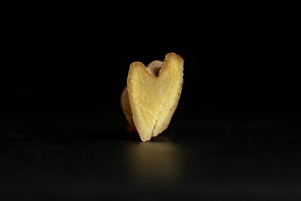 a half eaten banana sitting on top of a table