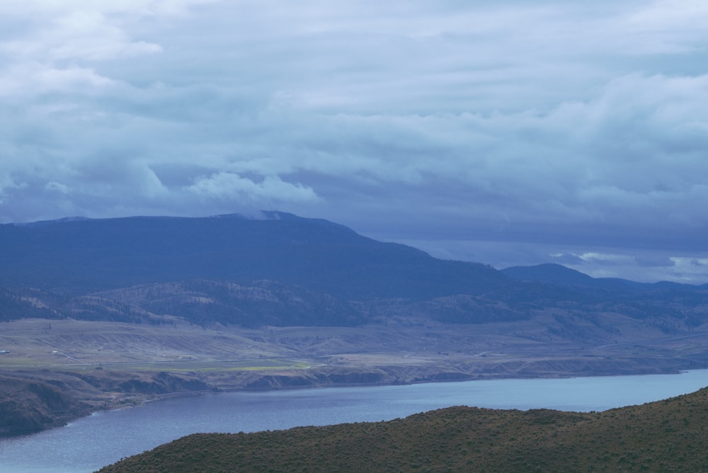 a large body of water surrounded by mountains