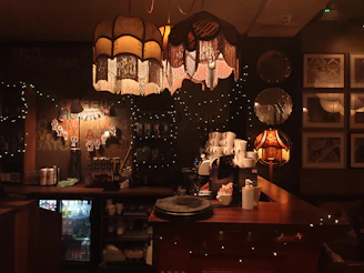 A cozy Italian coffee shop interior with warm lighting and vintage decor.