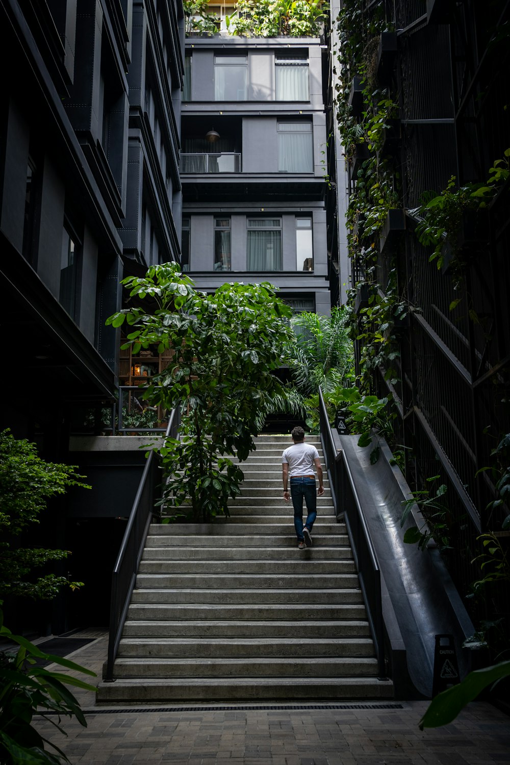 a man walking down a flight of stairs