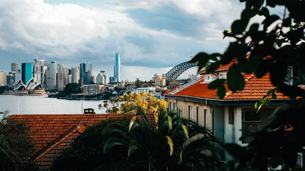 a view of a city with a bridge in the background