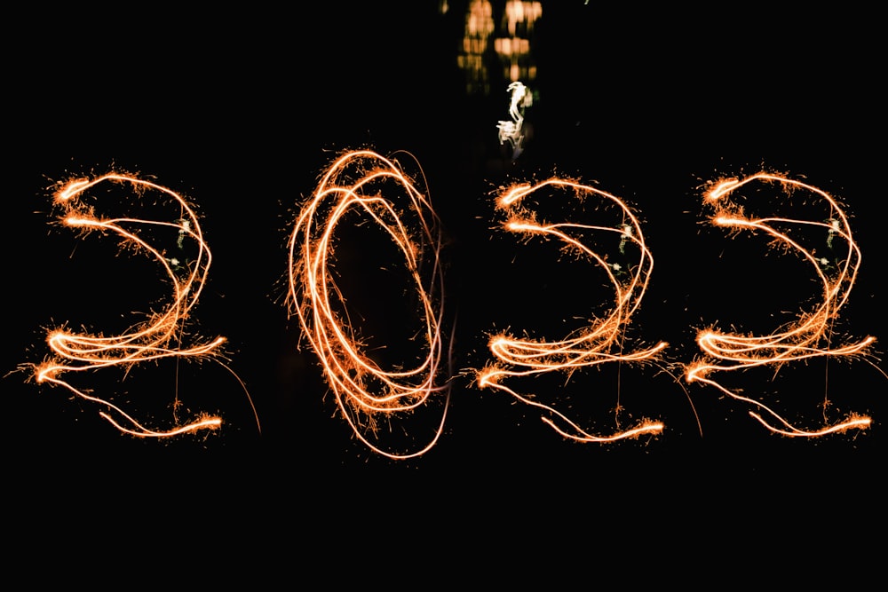 the word 2013 spelled out with sparklers in the dark