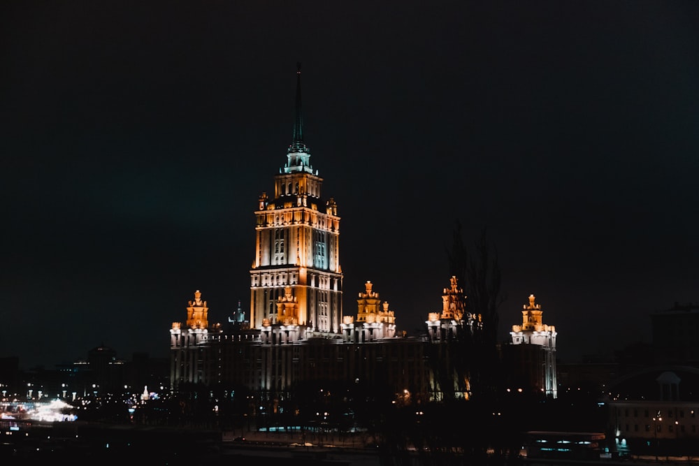 a very tall building with a clock on it's side