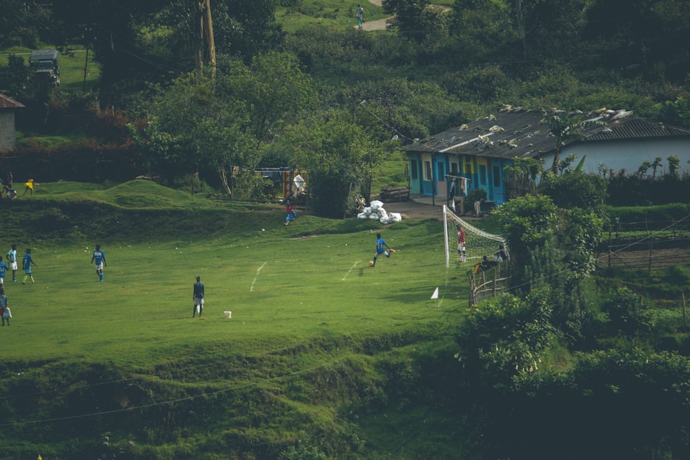 a group of people playing a game of soccer