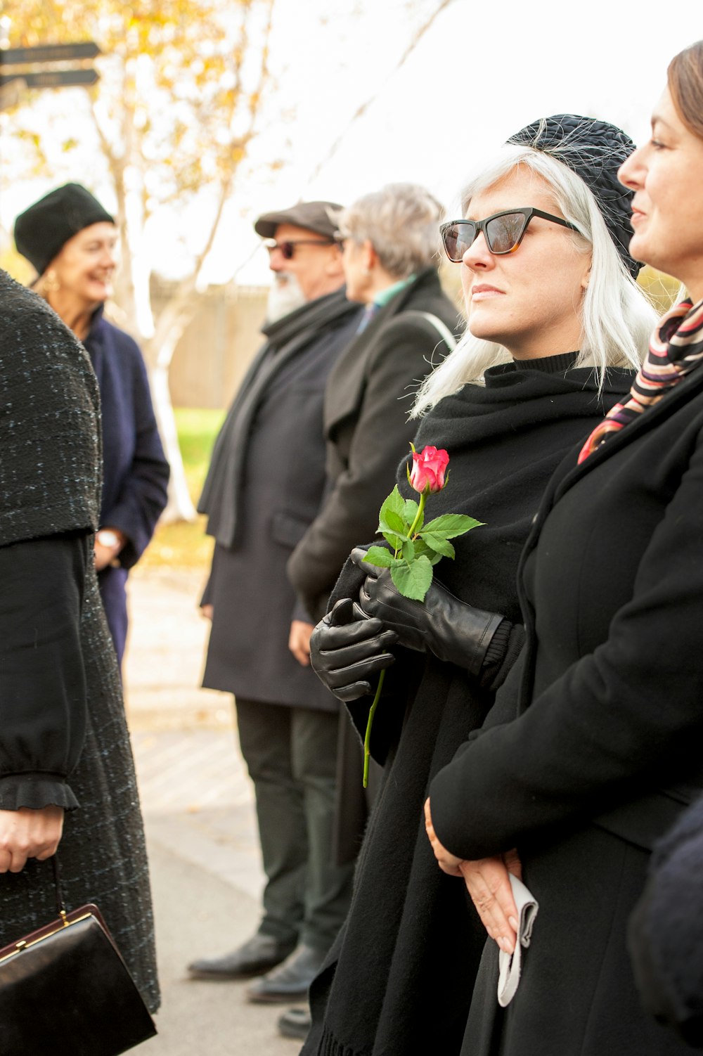 a group of people standing next to each other