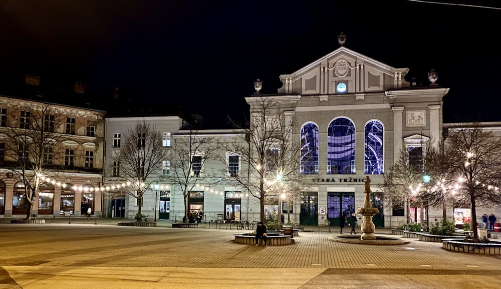 a large building with a clock on the front of it