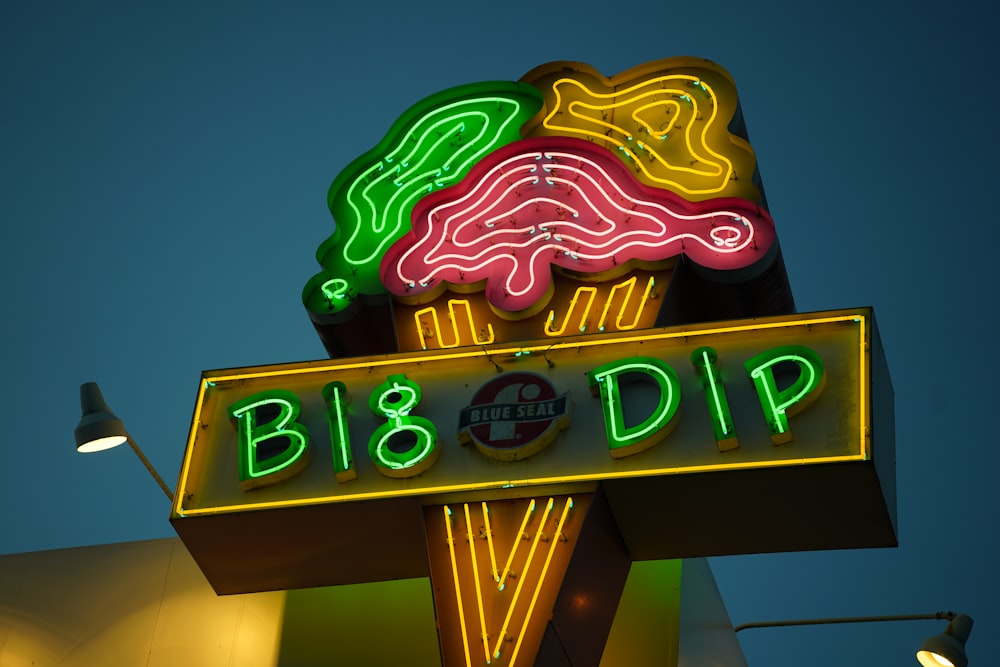 a neon sign that says bl8 dip
