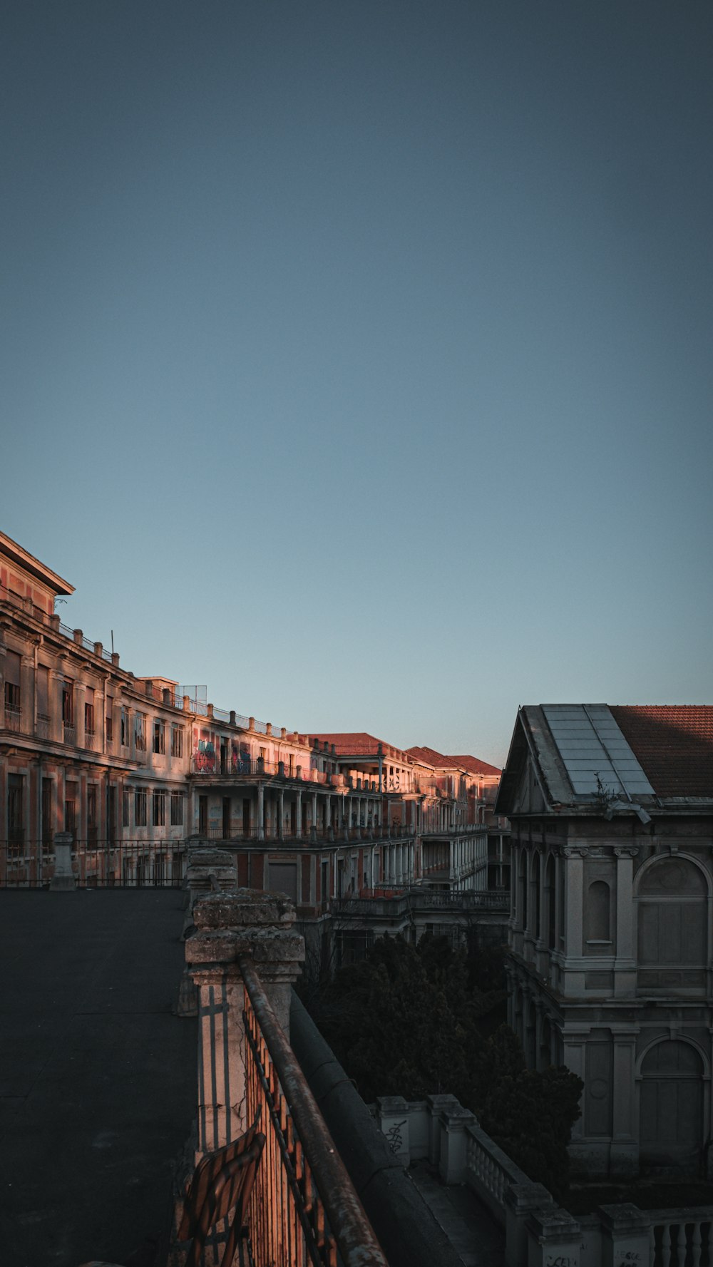 a row of buildings with a sky background