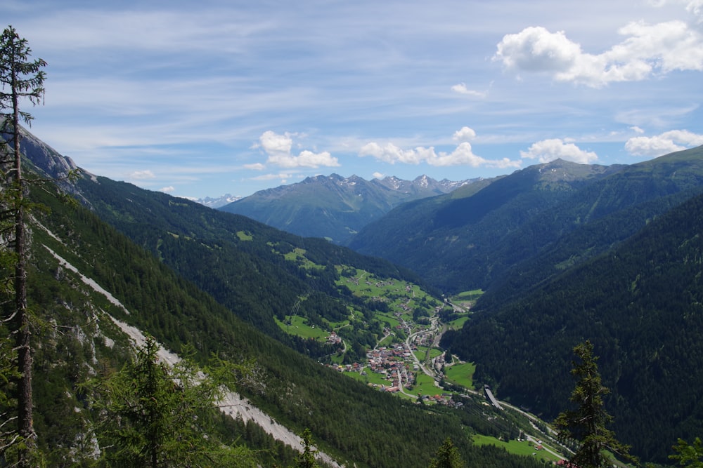 a view of a valley in the mountains