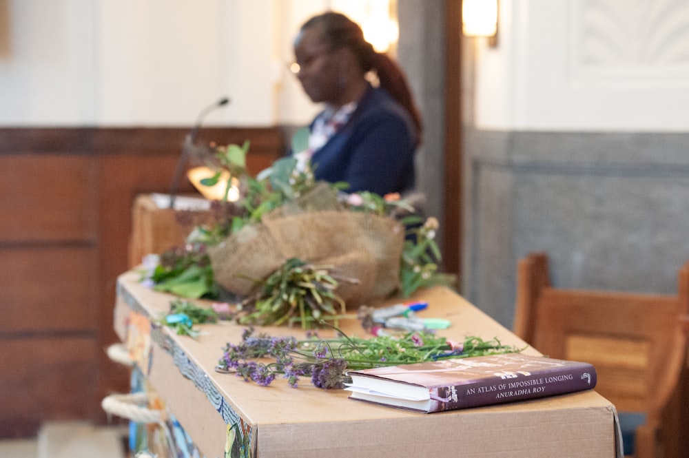 a table with a bunch of flowers on top of it