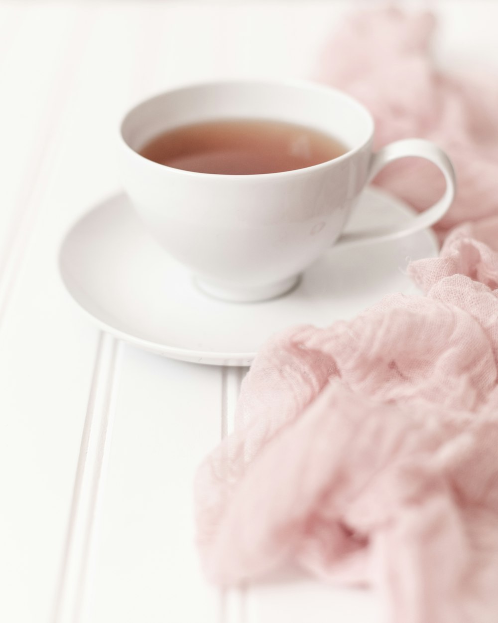 a cup of tea sitting on top of a saucer