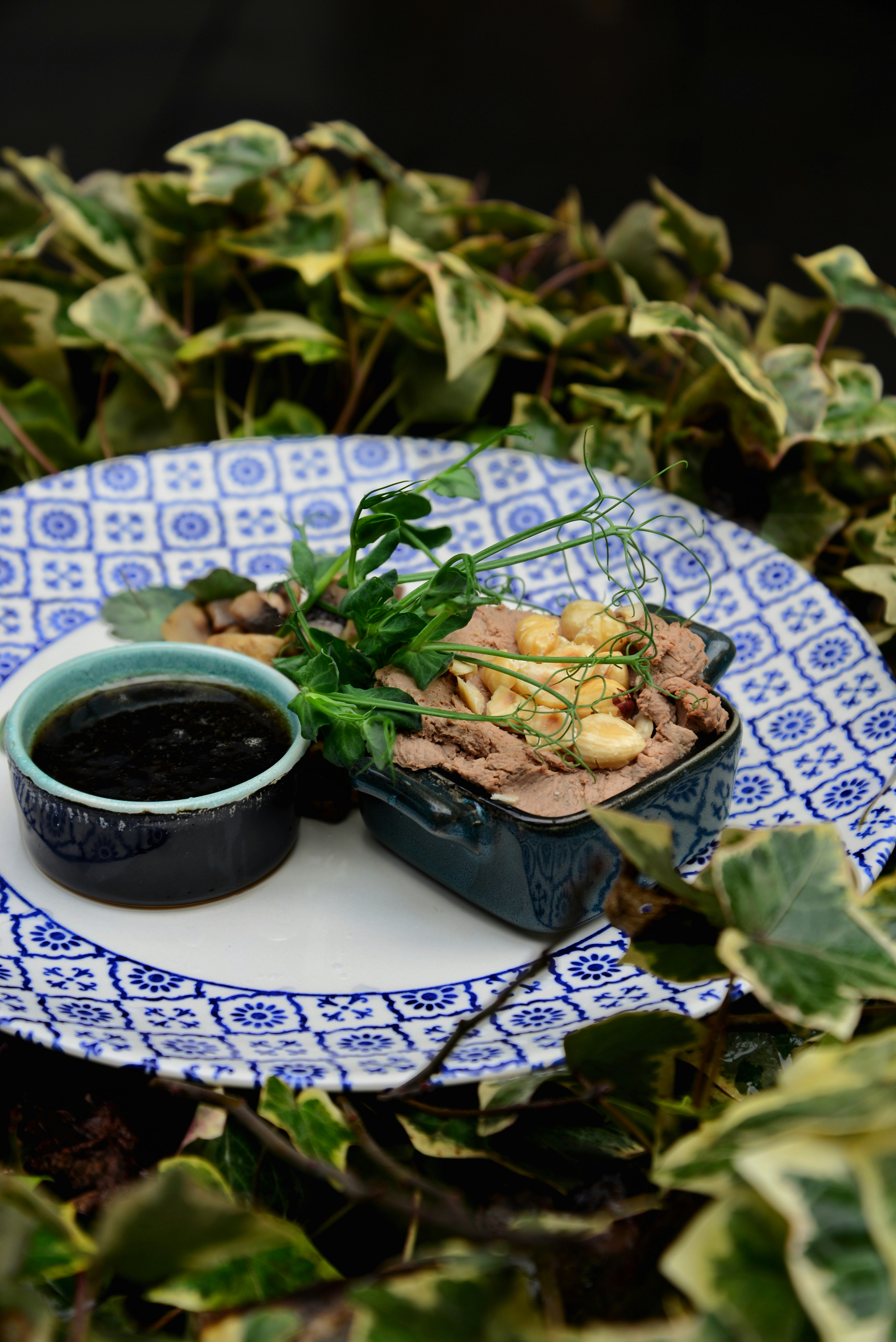 a blue and white plate with food on it
