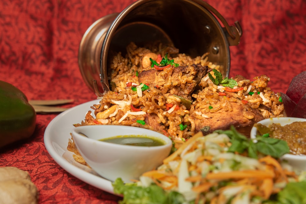 a plate of food on a red table cloth