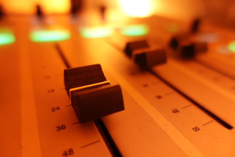 a close up of a sound board with tape