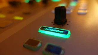 Close-up of a red glowing convert button on a clean, dark interface.