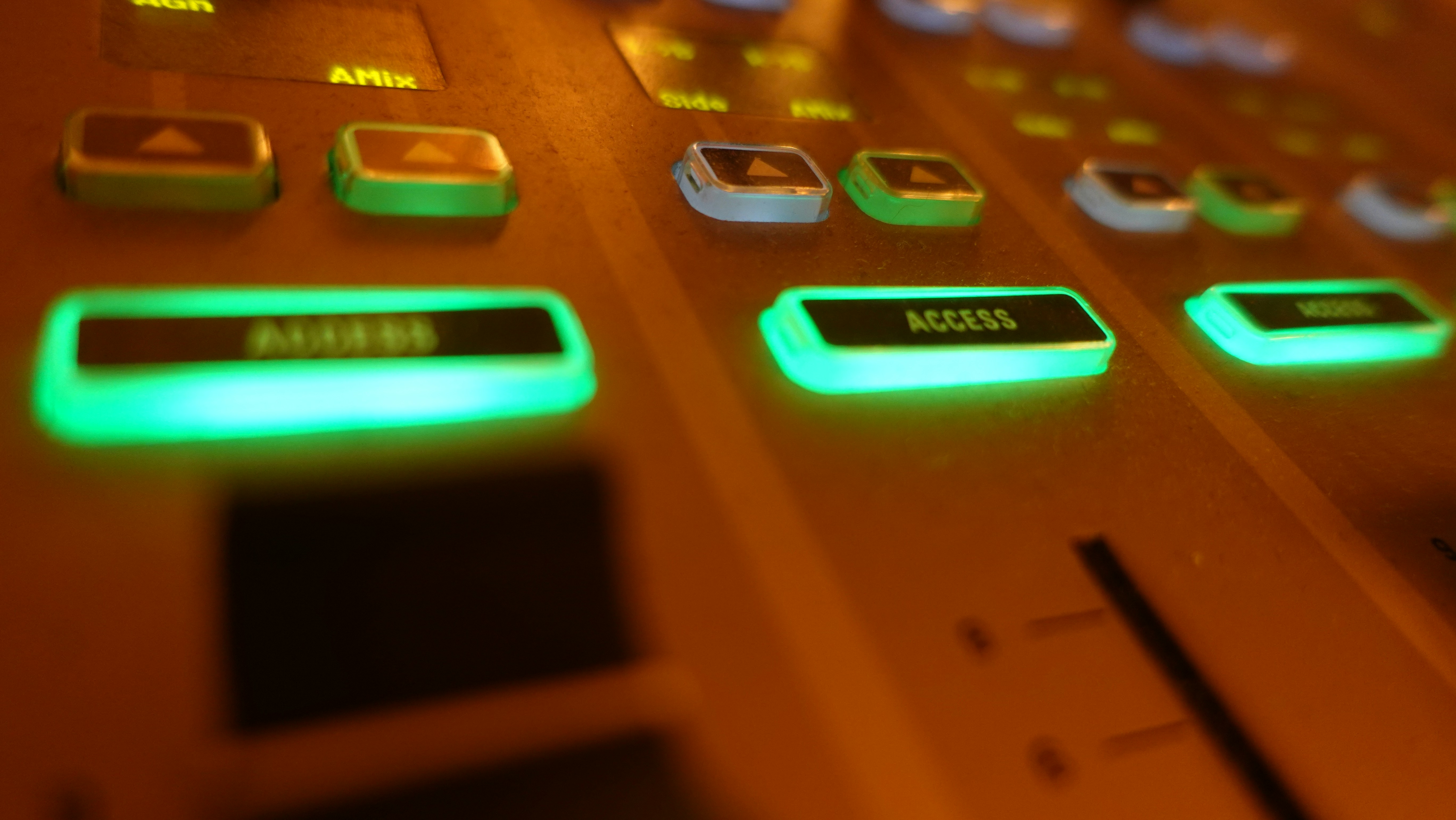 Access buttons on a mixing console.
