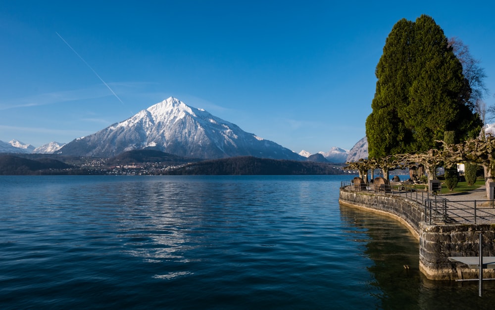 a lake with a mountain in the background