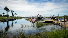 a bunch of boats that are sitting in the water