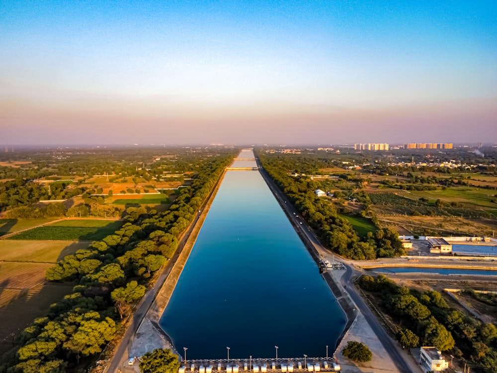 a large body of water surrounded by trees