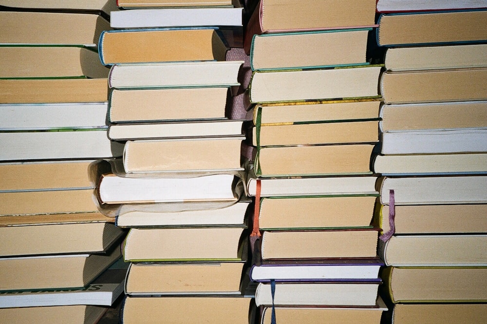 a stack of books sitting on top of each other