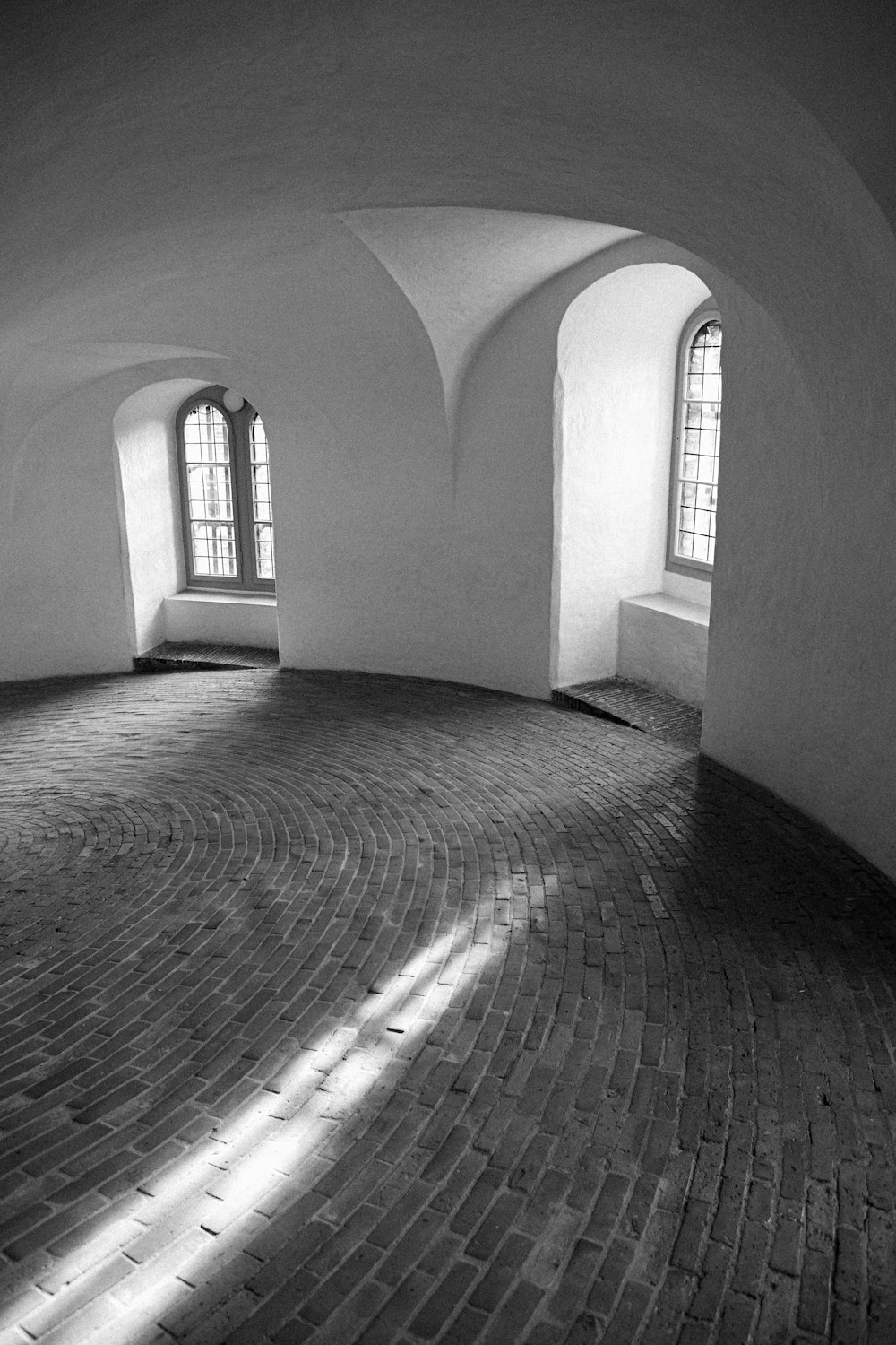 a black and white photo of a circular room
