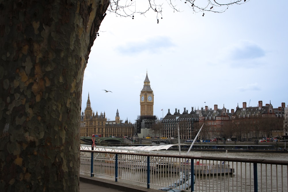 a large clock tower towering over a city