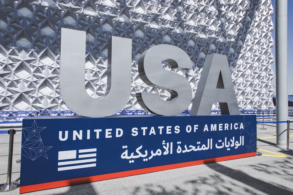 the united states of america sign in front of a building