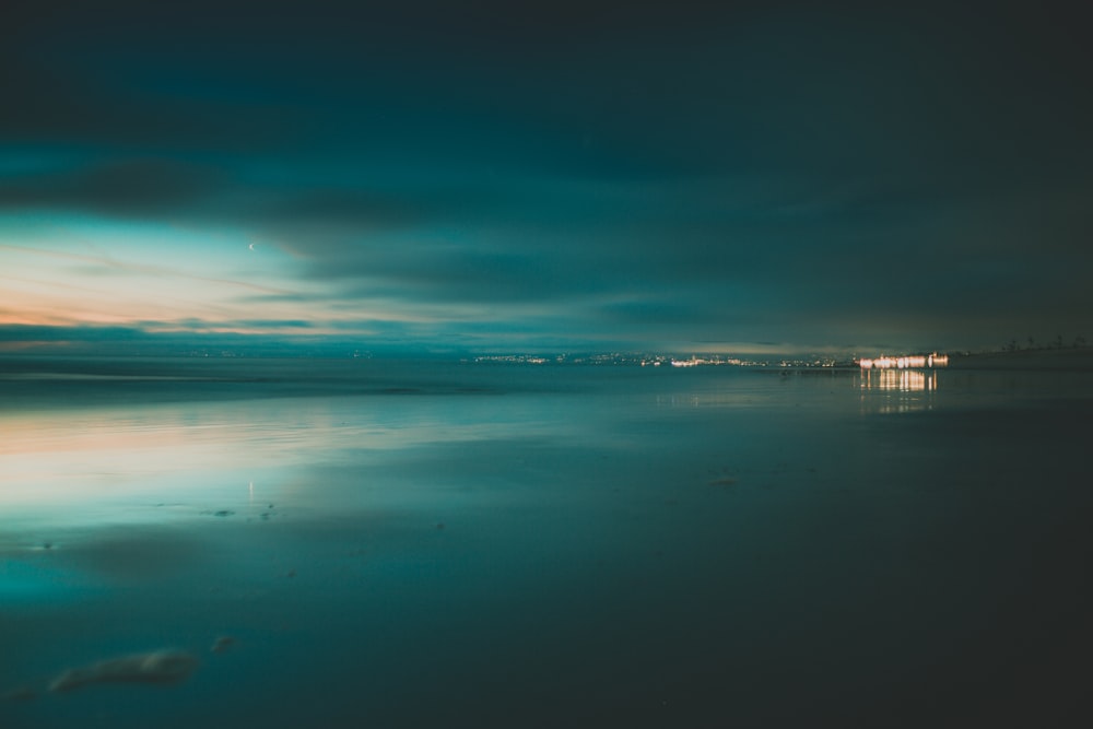 a view of a body of water at night