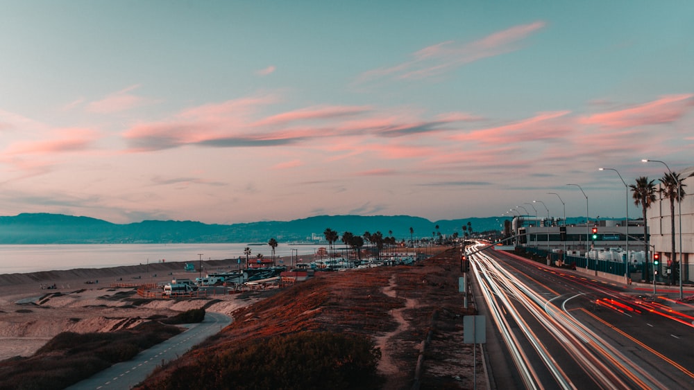 a view of a highway with cars driving on it