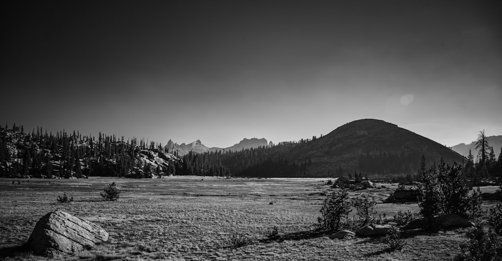 a black and white photo of a mountain range