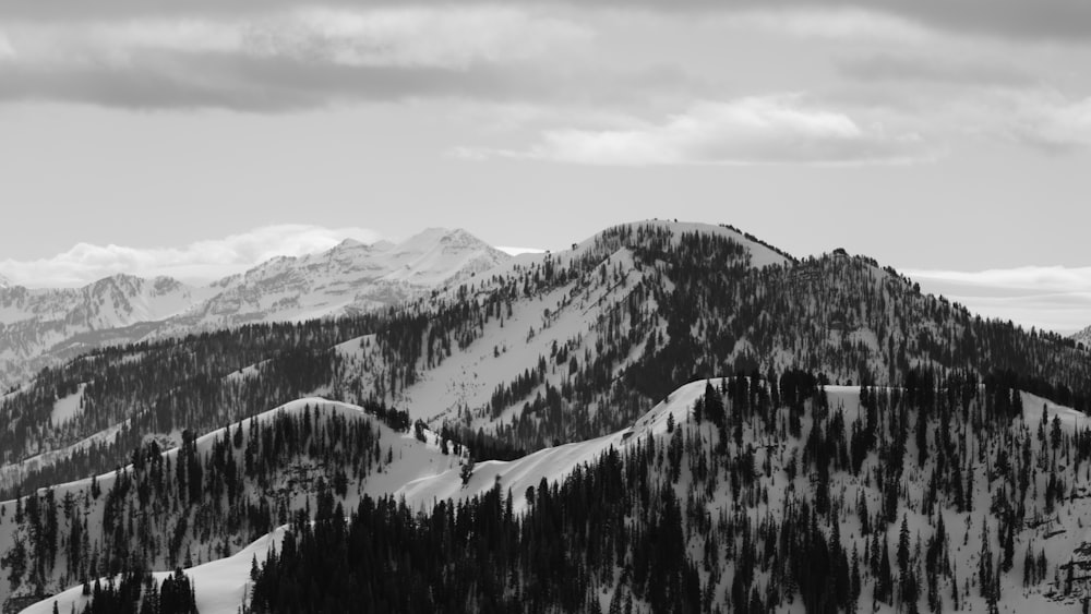 a black and white photo of a mountain range