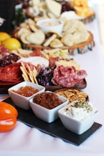 a table topped with lots of different types of food